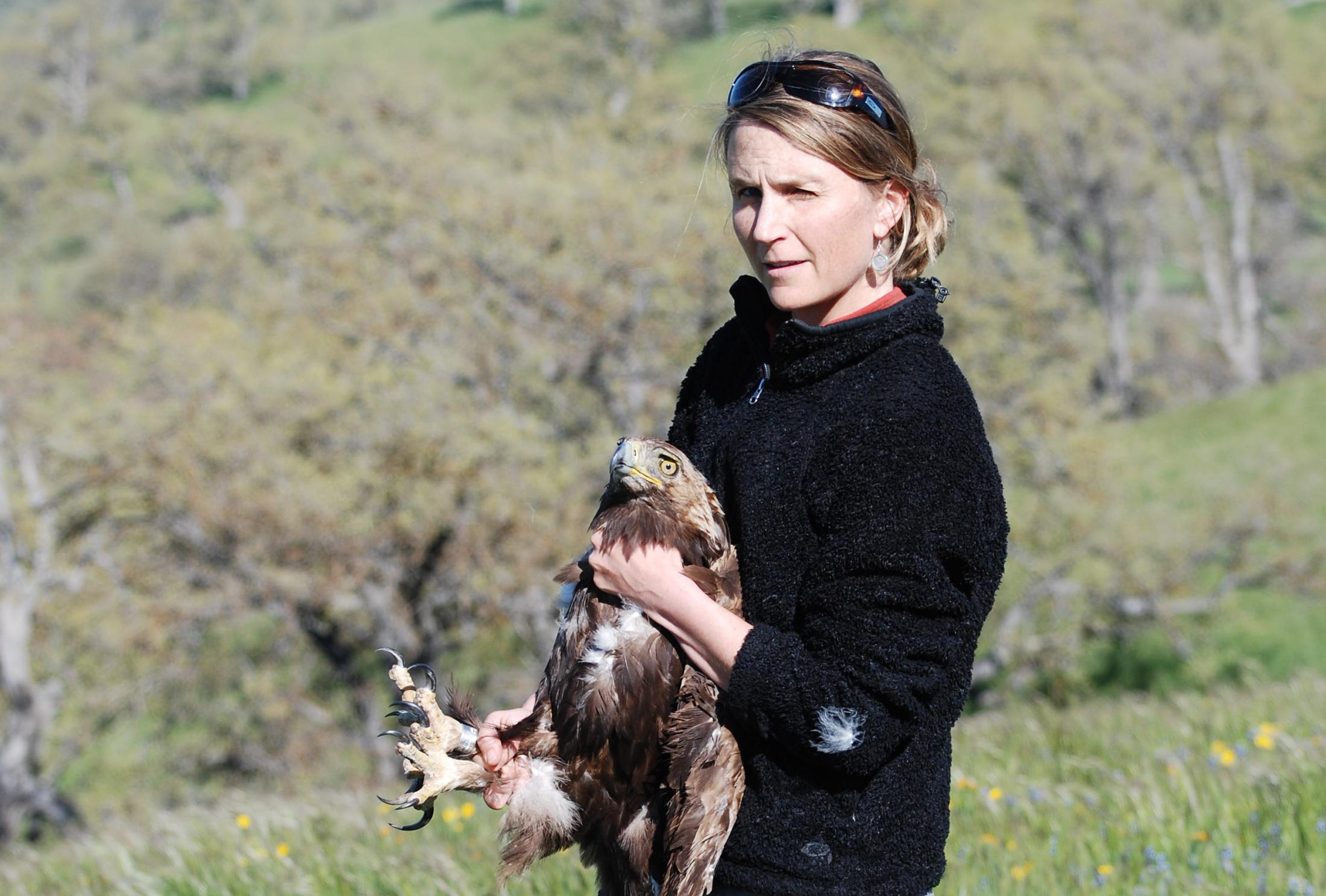 Terra Kelly holding golden eagle